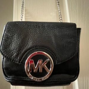 Michael kors leather crossbody bag.
